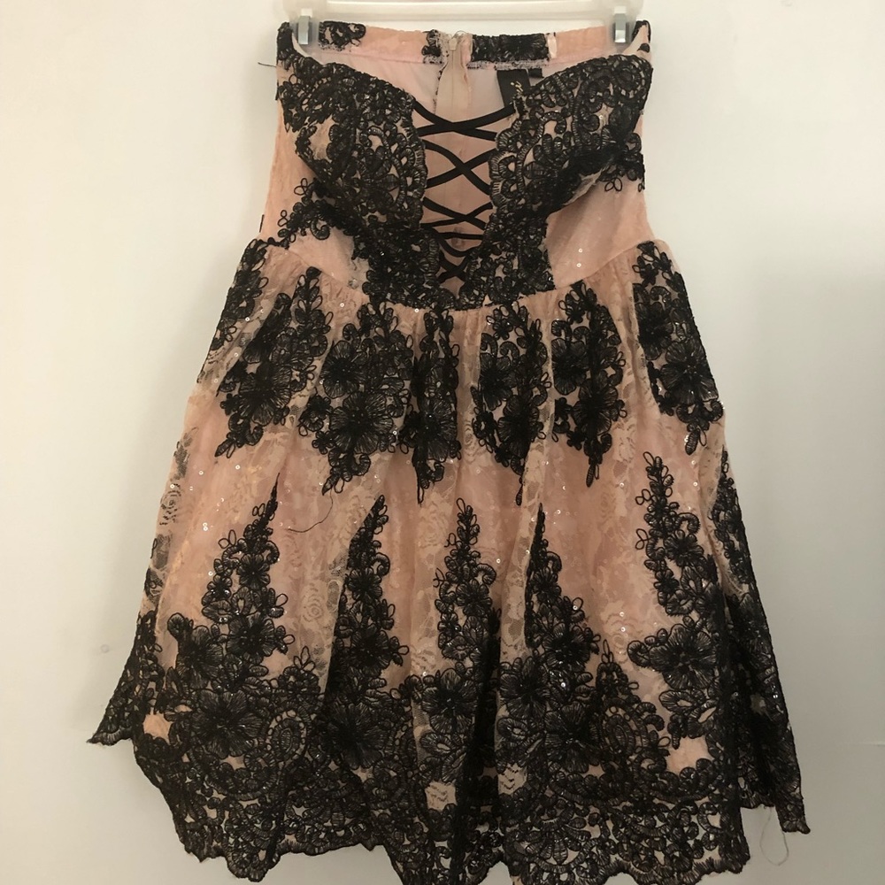 Sleeveless light pink homecoming dress